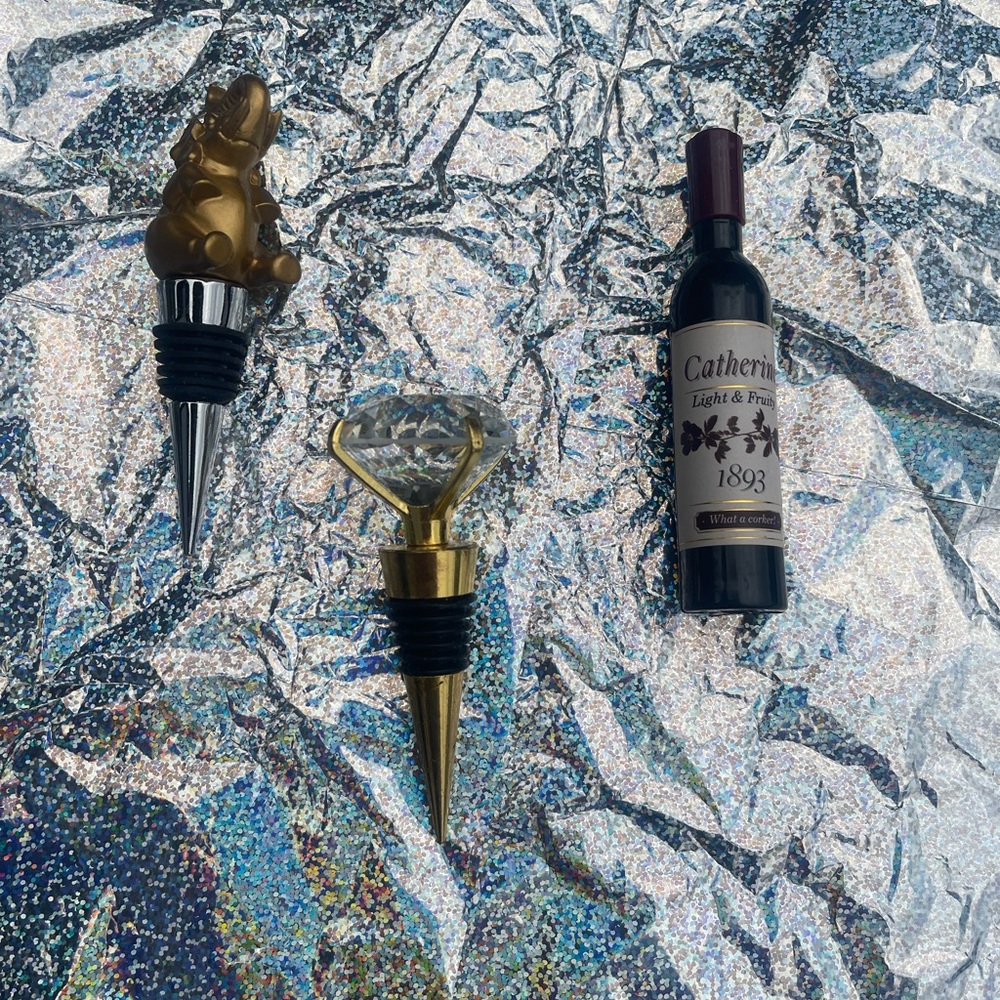 Wine Stoppers & one opener
